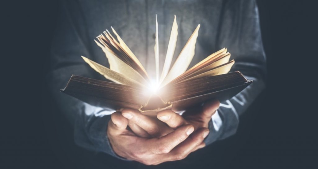 man holding bible